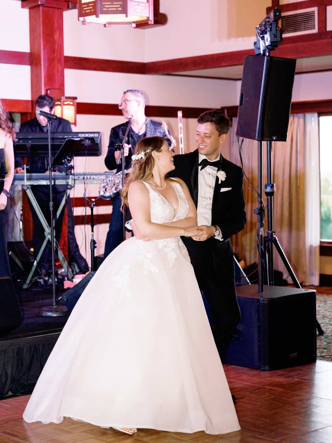 Bride and groom sharing a romantic dance during a wedding reception at Type A Soiree.